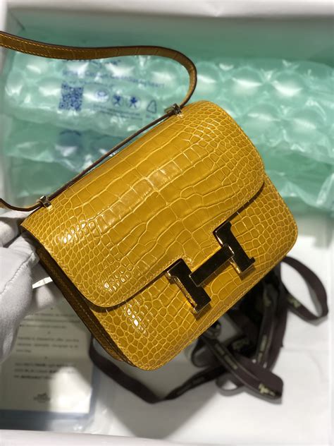 hermes jaune ambre alligator constance|hermes constance crossbody bag.